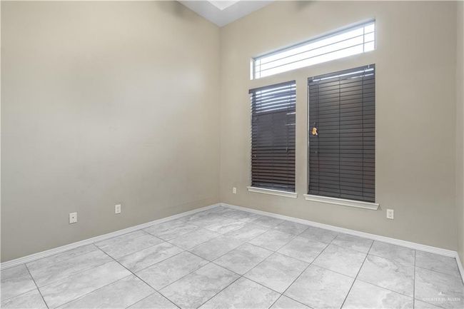 View of tiled spare room | Image 8