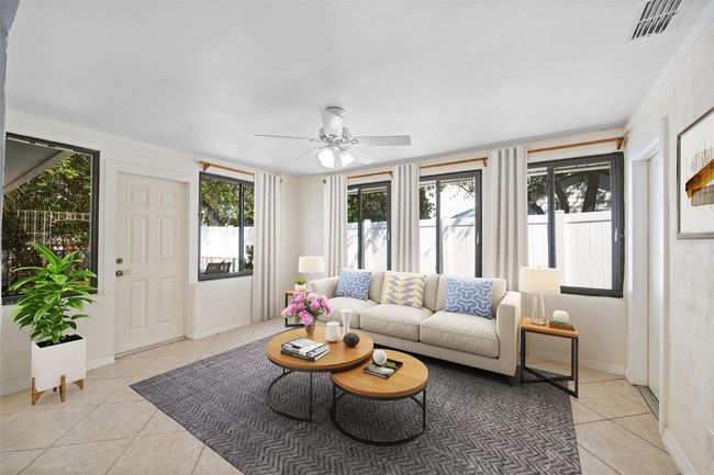virtually staged flex room as another living area | Image 13