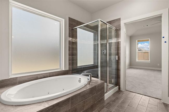 This photo is for illustrative purposes only and is not to be considered an exact replica of the finished home. Rendering does not match the finished product in terms of features, colors, landscaping, etc. Pricing, specifications, square footage and materials are subject to change at any time and without notice. | Image 9