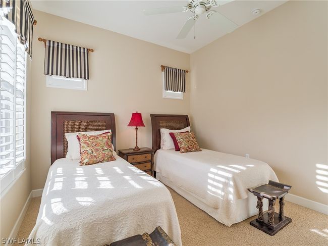 Bedroom with carpet floors and ceiling fan | Image 28