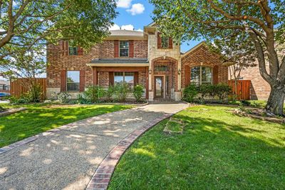 View of front of property featuring a front lawn | Image 1