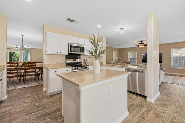 Recently added appliances, including a recent oven/range and dishwasher, bring modern convenience to everyday life. | Image 7