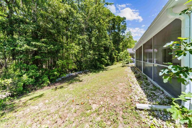 View of yard featuring a sunroom | Image 33