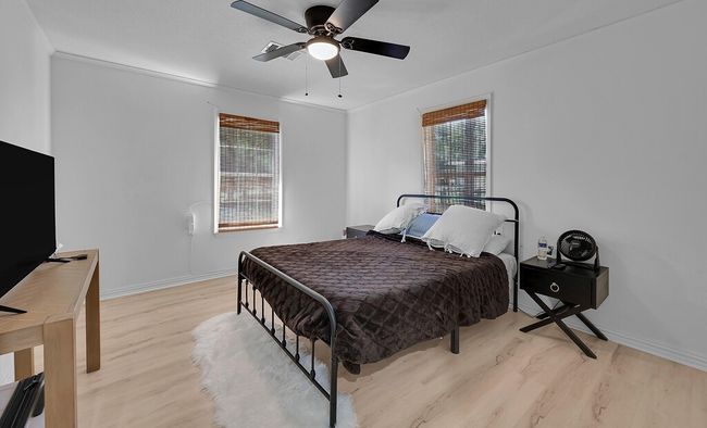 Bathroom with wood finished floors and toilet | Image 20