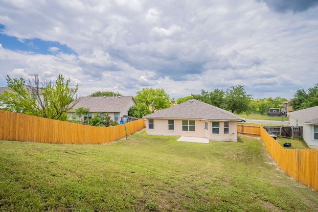 Rear view of property with roof with shingles | Image 33