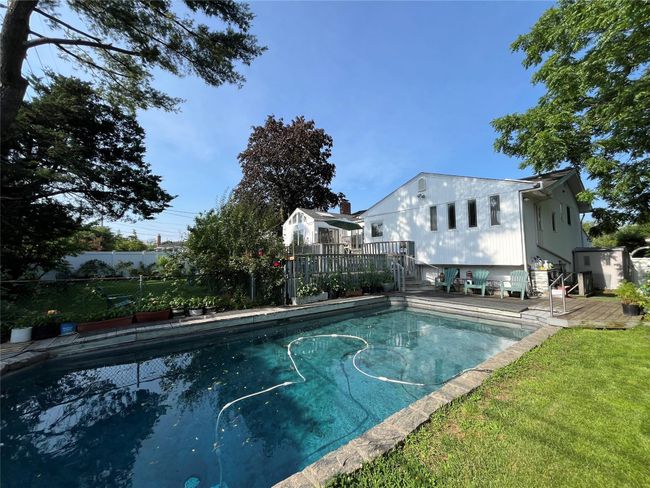 View of pool with a deck | Image 22