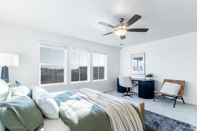 Bedroom featuring carpet and ceiling fan | Image 16