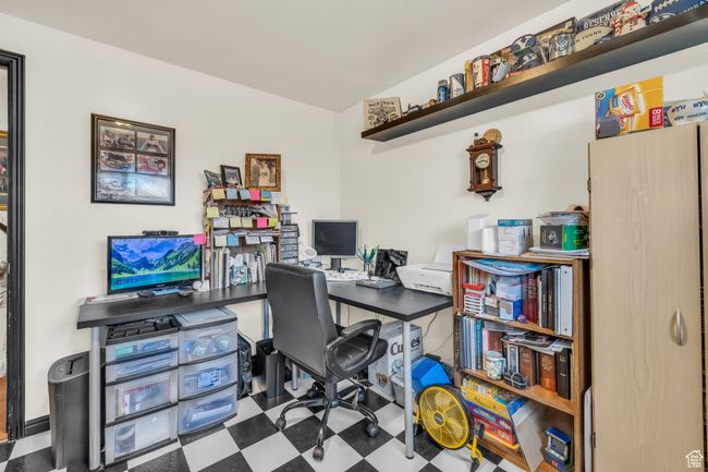 Office featuring tile patterned floors | Image 15