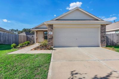 21807 Hickory Springs Court, House other with 3 bedrooms, 2 bathrooms and null parking in New Caney TX | Image 1