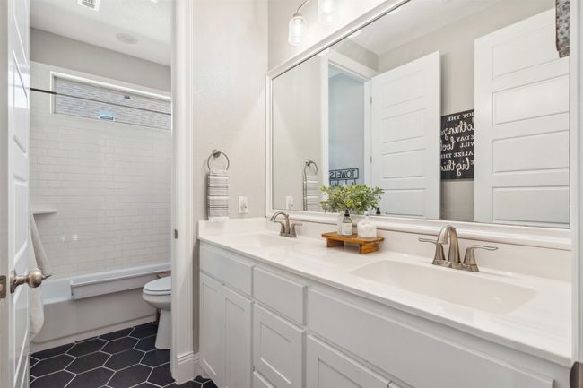 Full guest bathroom - dual sinks and drip dry area | Image 30
