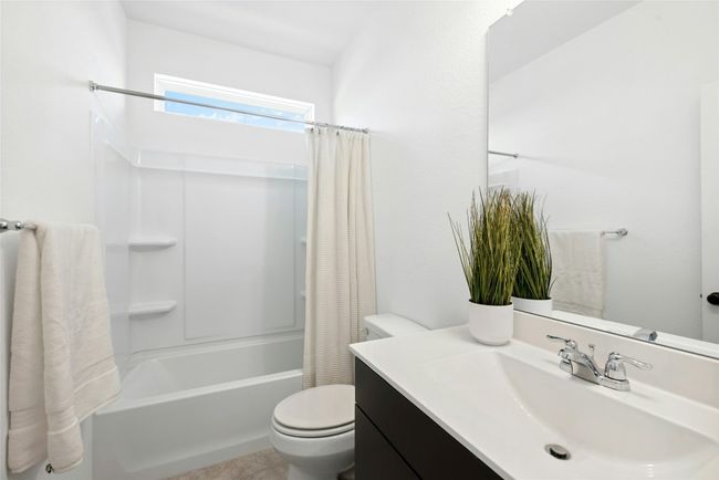 Secondary bathroom with natural light | Image 19