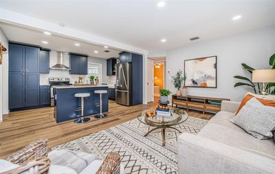 Meet your gorgeous new open kitchen / living dream area. Light, bright, and clean. | Image 2