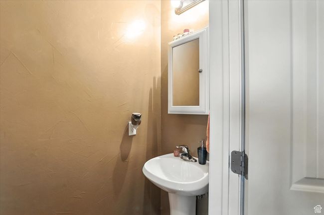 Bathroom featuring a sink | Image 13