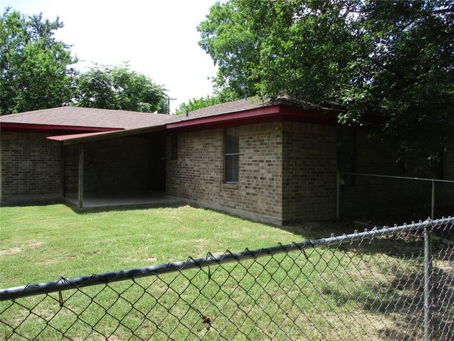 Rear view of property with brick siding | Image 5
