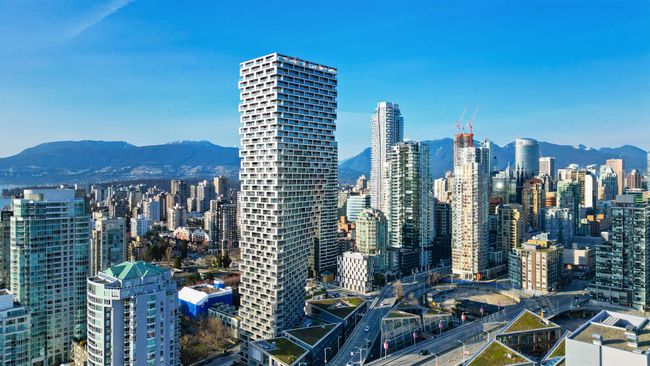 View of city with a mountainous background | Image 17