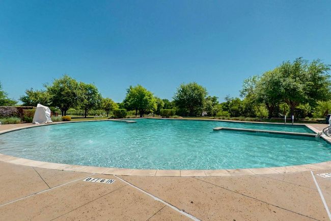 View of community pool. HOA FEE is $40 per month. | Image 38