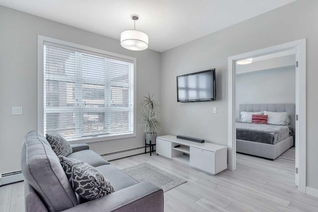 205 - 383 Smith Street Nw, Home with 2 bedrooms, 2 bathrooms and 1 parking in Calgary AB | Image 10