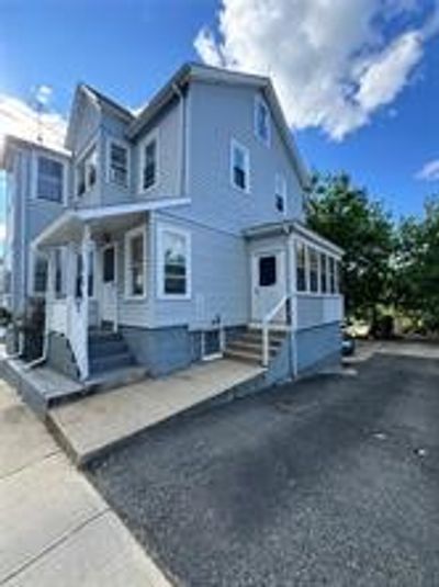 40 Paradis Avenue, Home with 7 bedrooms, 3 bathrooms and 4 parking in Woonsocket RI | Image 3