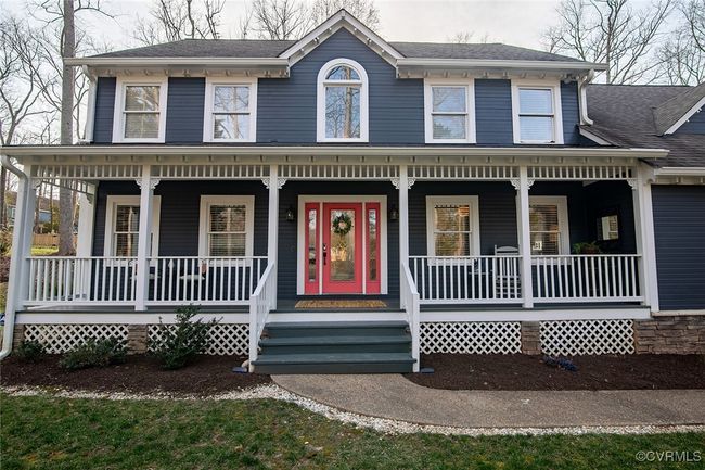 View of front of house with roof with shingles and a porch | Image 44