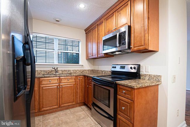 APT-101 - 12009 Golf Ridge Ct, Condo with 3 bedrooms, 2 bathrooms and null parking in FAIRFAX VA | Image 13