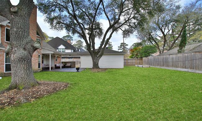 Behind the garage, there are couple of raised flower or vegetable beds. Are you ready to have a garden this summer? | Image 48