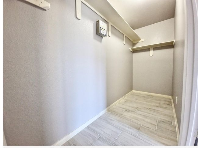 View of spacious closet | Image 18