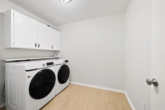 Laundry room, washer and dryer included in the sale | Image 36