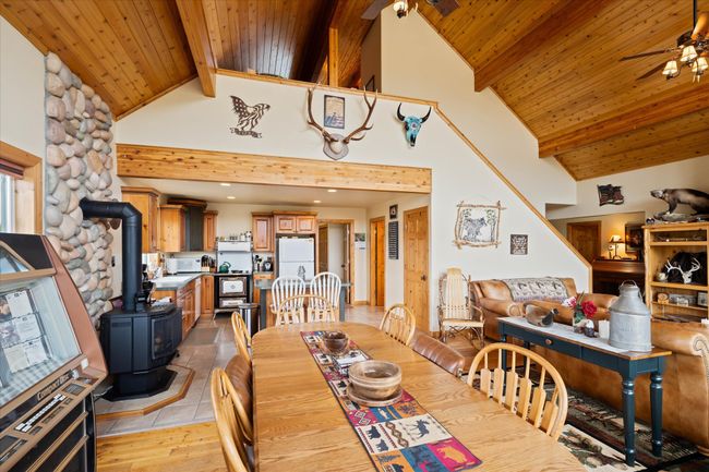 Main Cabin - Dining Room to Kitchen and Living Room | Image 27