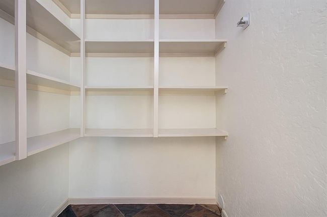 Walk in pantry. | Image 19