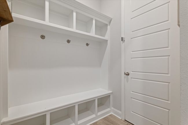 Mudroom featuring light wood-style floors | Image 18