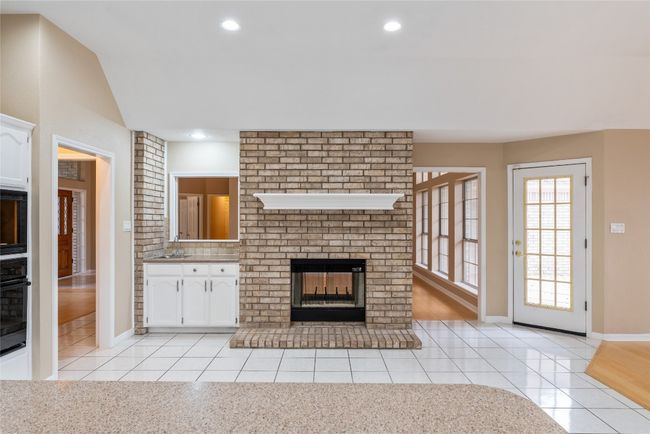 Wet bar and see through gas fireplace | Image 11