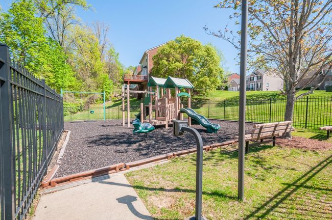 Lovely community playground right next to the pool | Image 52
