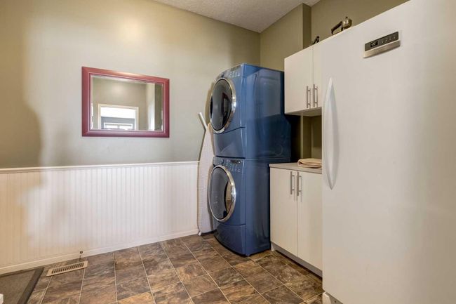 569 Boulder Creek Circle Se, House other with 4 bedrooms, 3 bathrooms and 6 parking in Langdon AB | Image 28