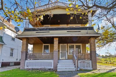 View of front of property featuring a porch | Image 1