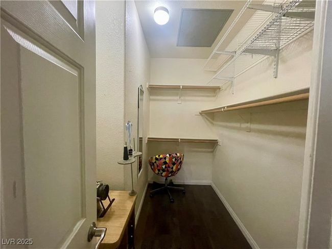 Spacious closet featuring wood finished floors | Image 32