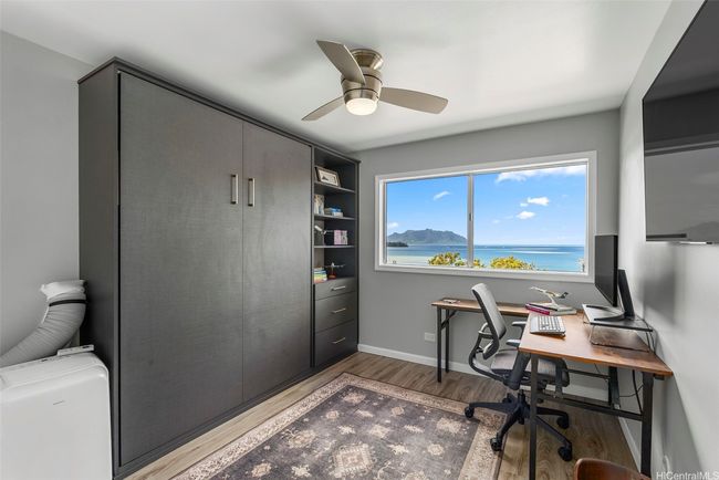 The first bedroom has a newer install murphy bed, enabling this room to function as an office if needed. | Image 18