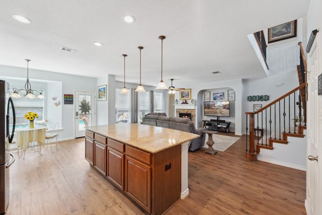 Open plan with views to living and backyard pool | Image 6