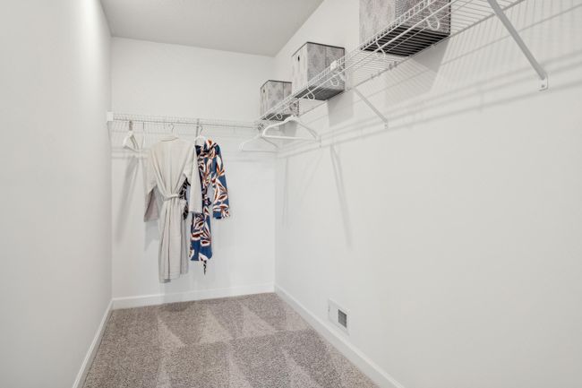 (Photo of a decorated model, actual homes finishes will vary) Another view of the primary bath. | Image 12