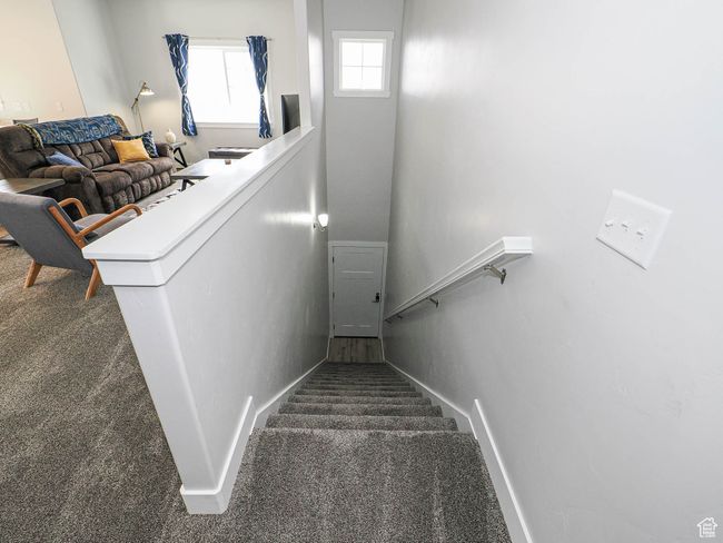Stairway with carpet floors and baseboards | Image 6