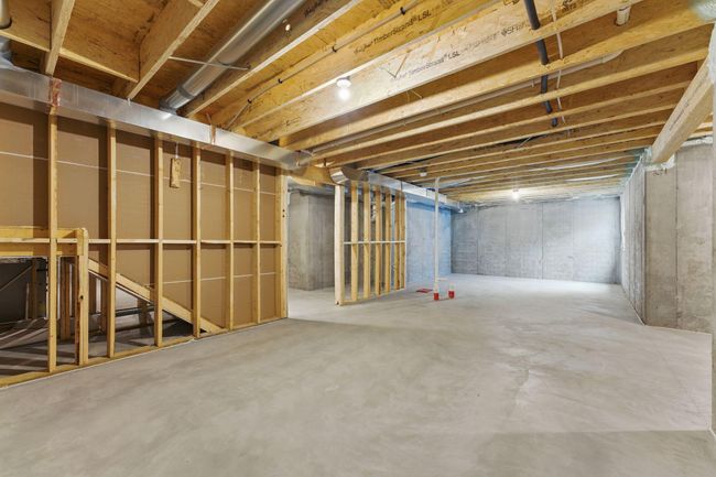 The unfinished basement features plenty of storage and possibilities to grow into! | Image 28