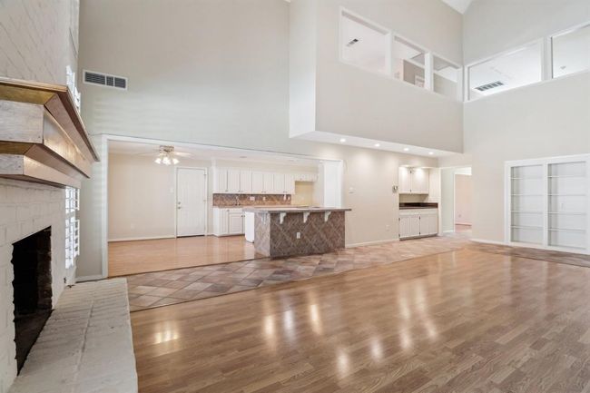 Open floor plan with high ceilings. | Image 11