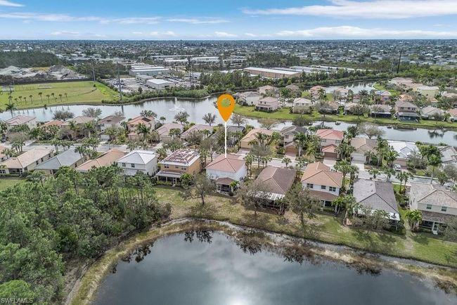 Drone / aerial view featuring a water view and a residential view | Image 6