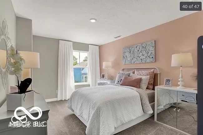 Upstairs 2nd carpeted bedroom featuring visible vents | Image 21