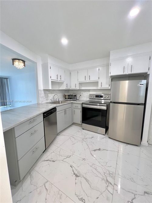 307-3-1710 Ne 191st St, Miami, FL, 33179-4202 | Card Image