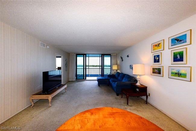 LIVING AREA SHOWING ENTRANCE TO OWNER'S SUITE | Image 15