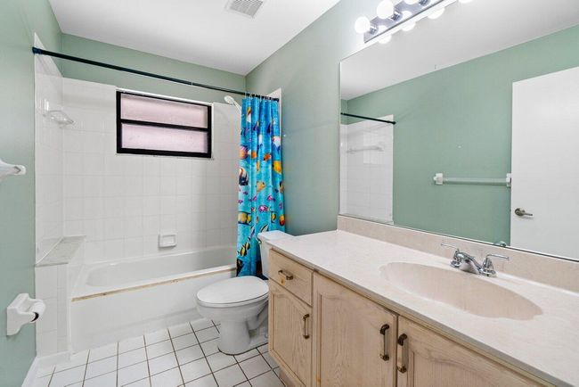 61 W Rubber Tree Dr, House other with 3 bedrooms, 2 bathrooms and null parking in Lake Worth FL | Image 15