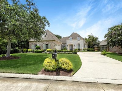 First house on left as you enter the gates to Cypress Lakes. | Image 3