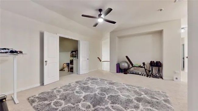 Bedroom featuring carpet floors and a ceiling fan | Image 9