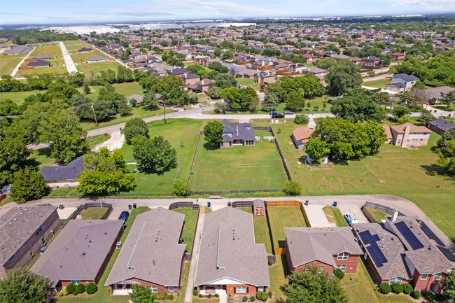 Aerial view of property and surrounding area with nearby suburban area | Image 30