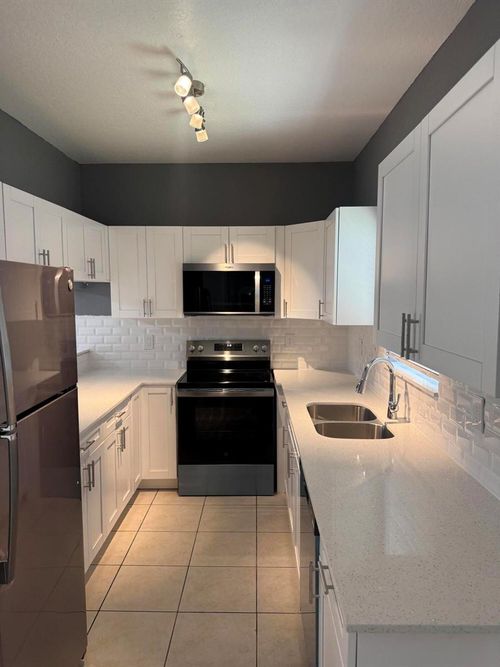 1117 Colonial Palms Way, Palm Springs, FL, 33406-6616 | Card Image
